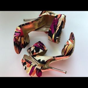 Beautiful colorful shoes with gold heels
